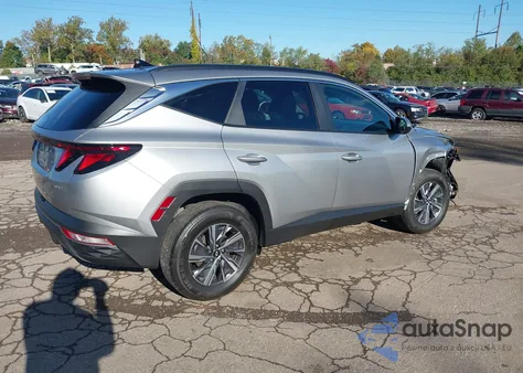 2024 Hyundai Tucson Hybrid Blue z USA, uszkodzony, nr VIN KM8JBCD10RU207301